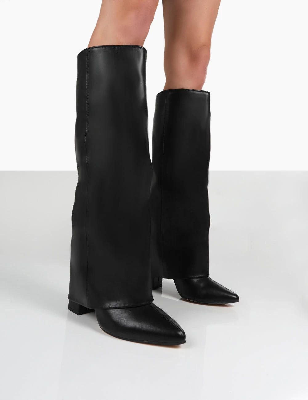 Zendaya Black Pointed Toe Knee High Block Boots 1 Zendaya Black Pointed Toe Knee High Block Boots