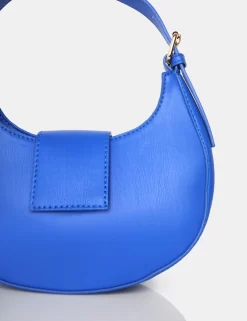 The Irie Cobalt Blue PU Circular Buckle Strap Grab Bag 5 The Irie Cobalt Blue PU Circular Buckle Strap Grab Bag -Chic Step Shop 2copy 4d496bf5 4051 4043 aedd bff3816bd4cd scaled